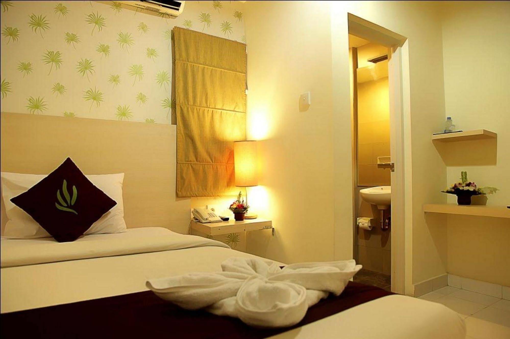 Santosa City Hotel 丹帕沙 外观 照片