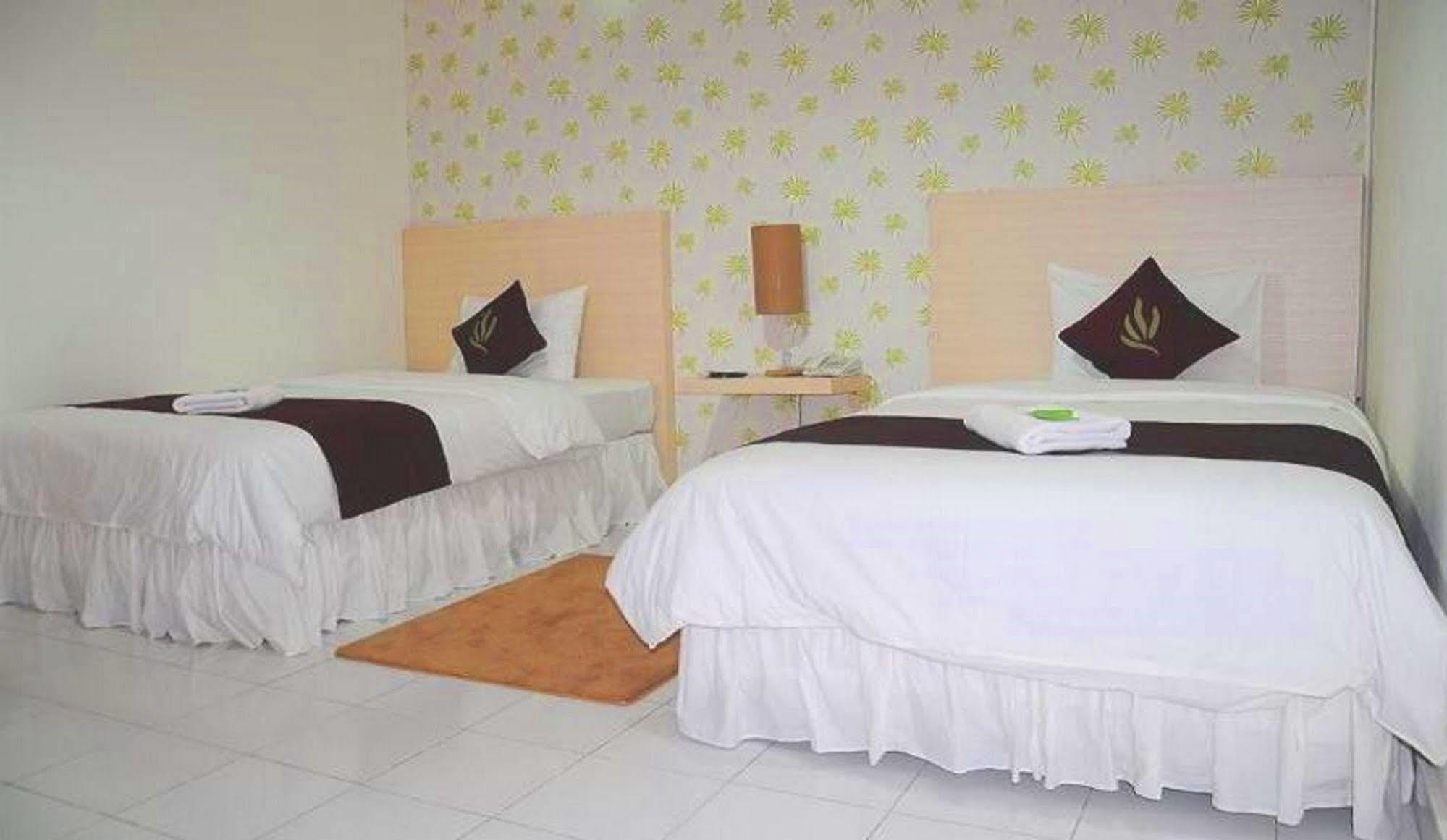 Santosa City Hotel 丹帕沙 外观 照片
